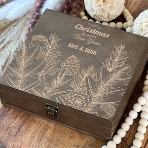 a wooden box sitting on top of a wooden table