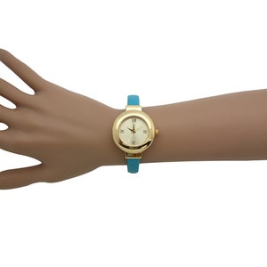 NIMI Petite Gold-Tone Bangle Bracelet Watch