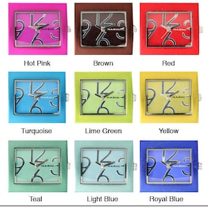 May include: A set of ten square watch faces in various colors, including hot pink, brown, red, turquoise, lime green, yellow, teal, light blue, and royal blue. Each face features a black and white clock face with the word "NARMI" printed on it. The watch faces are 1 inch wide and 1.25 inches high.