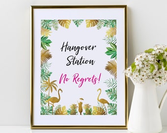 May include: A printable sign with a tropical theme. The sign says "Hangover Station No Regrets!" with gold foil accents and pink flamingos.