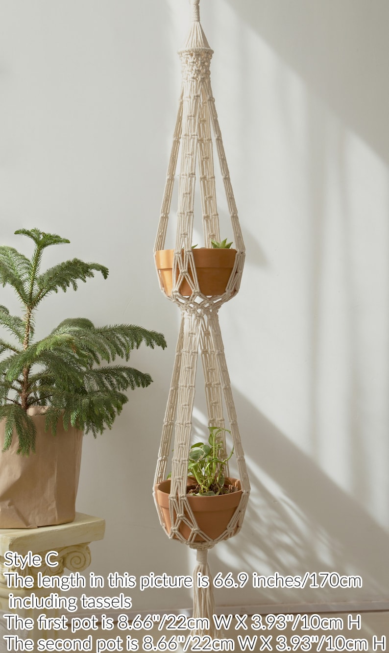 Handcrafted macrame plant hanger showcasing two suspended pots with intricate knotwork detail, set against a minimalist background to emphasize its delicate design and craftsmanship.