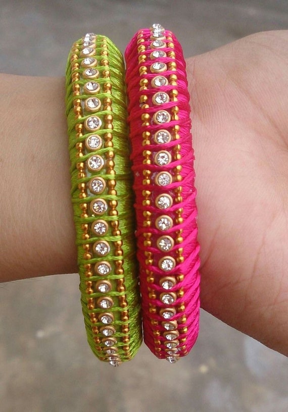 Pink and green 2024 silk thread bangles