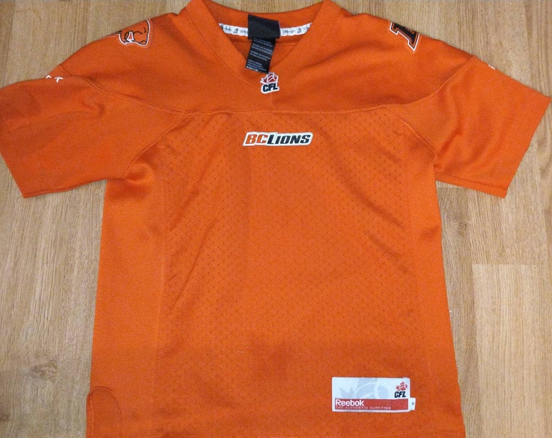 BC Lions jersey fits like a women/'s XS Youth S