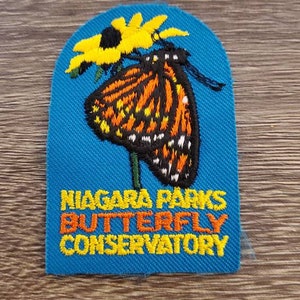 Parche de mariposa vintage de los parques del Niágara de los años 90, termoadhesivo