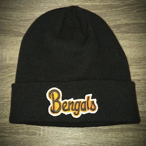 May include: Black beanie with an orange and black embroidered "Bengals" logo.