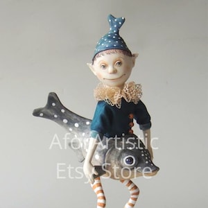 E-Class - The Elf and His Fish by Marlaine Verhelst, NIADA Artist