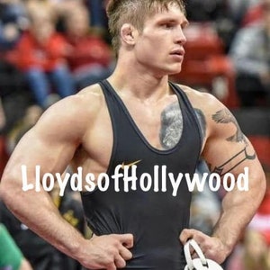 Handsome Athletic Muscular Wrestler With Tattoos on Arm and Chest Candid Photograph 2022