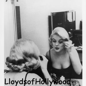 Marilyn Monroe In Mirror Applying mascara  Photograph 1960