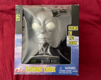 UFO X Files Testa di alieno grigio Salvadanaio in plastica extraterrestre con monete e occhi che si illuminano al buio, fantascienza, fuori produzione NRFB 1998