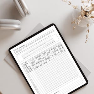 Self Care Habit Journal shown on ipad on clean minimalist desk. Sleep tracker and water tracker.