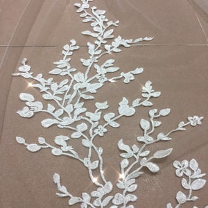ADDING More sequins, crystals, flowers