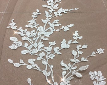 ADDING More sequins, crystals, flowers