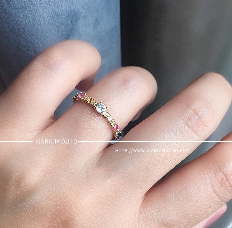 Gold ring with colored stones deals