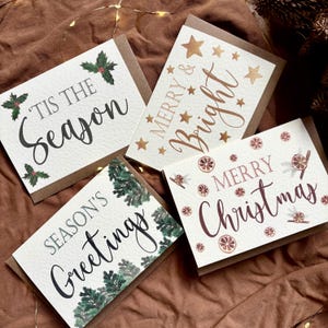 Paquete de tarjetas navideñas, diseños individuales, tarjetas de felicitación de temporada.