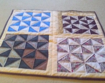 Kleine handgemaakte quilt