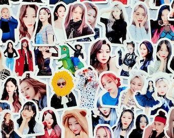May include: A collection of colorful stickers featuring various images of women with different hairstyles and clothing. The stickers are arranged in a random pattern and are all on a white background.