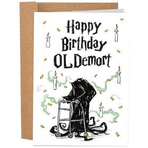 May include: A birthday card with a brown envelope. The card features a black Grim Reaper character using a walker, with the text "Happy Birthday OL Demort". The design includes candles and confetti.
