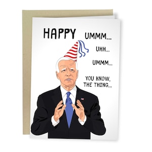 May include: A greeting card featuring a cartoon illustration of a man wearing a party hat. The text on the card reads "Happy Ummm... Uhh... Ummm... You know, the thing..."