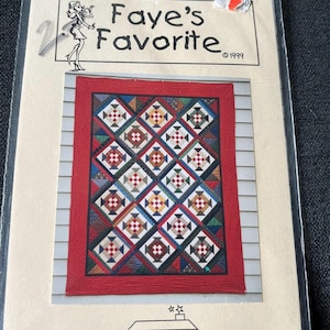 May include: A package for a quilt pattern titled "Faye's Favorite" from 1999. The quilt design features a red border with a repeating pattern of diamonds in various colors including red, white, blue, and green. The package also includes the text "House of Quilts" and the names of the designers.