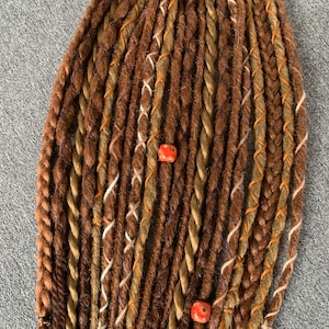 Proud Ginger | SE or DE dreadlocks extensions | synthetic dreads | partial or full sets | honey blonde and copper colors