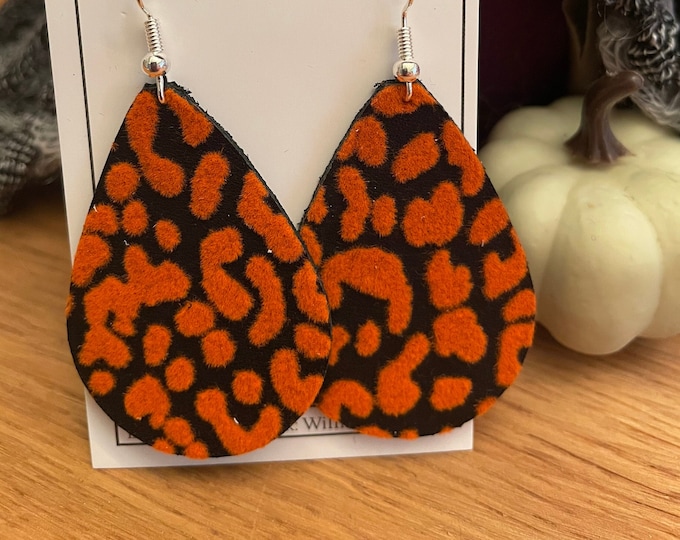 Black with raised orange leather teardrop earrings