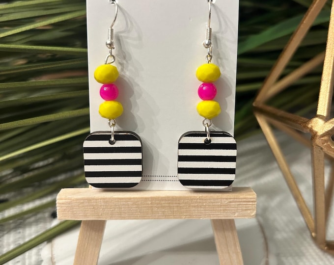 black and white stripe wooden earring with pink and yellow beaded accent