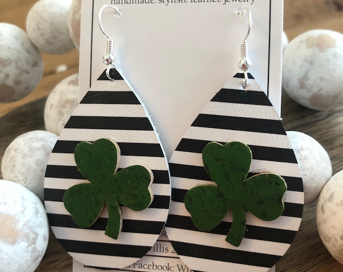 Green shamrock with black and white stripe leather teardrop earrings