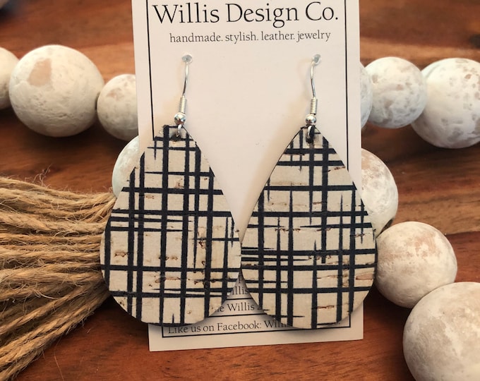 Black and white crossed line cork on leather earrings