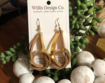 Gold cork on leather knot earrings