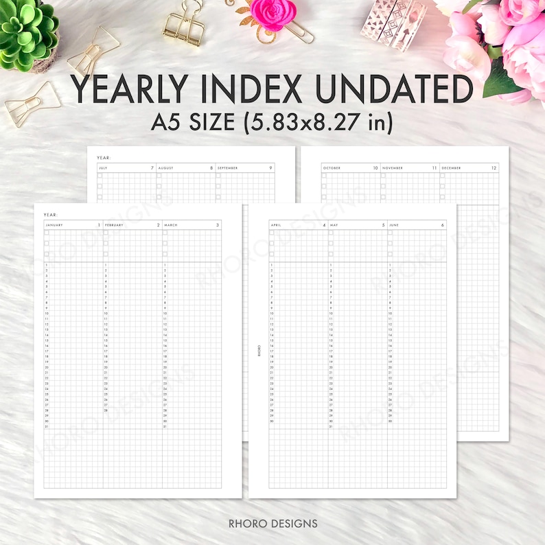 May include: White undated yearly index planner inserts, A5 size (5.83x8.27 in), with grid and date columns. The text "YEARLY INDEX UNDATED" is at the top. The brand name "RHORO DESIGNS" is at the bottom.