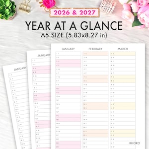 May include: Year at a Glance A5 size planner pages for 2026 and 2027. The pages are white with pink and peach accents. The planner includes a monthly calendar layout with dates and days of the week. The size is 5.83x8.27 inches.