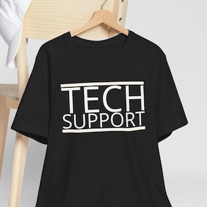 May include: Black t-shirt with white text that reads "TECH SUPPORT" in a box.