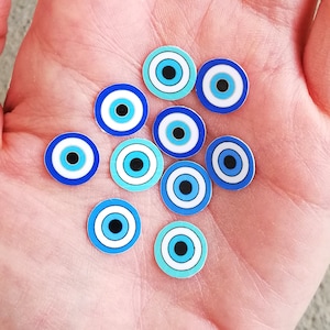 Lot de 10 mini-autocollants en vinyle imperméables Tiny Evil Eye pour ordinateur portable