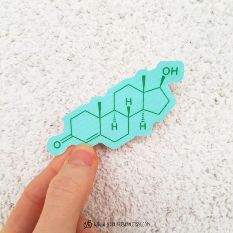 May include: A light blue sticker featuring a teal chemical structure diagram. The sticker has a unique shape and includes the letters "H" and "O" within the design. The website address "www.yakutkeskin.etsy.com" is visible at the bottom.