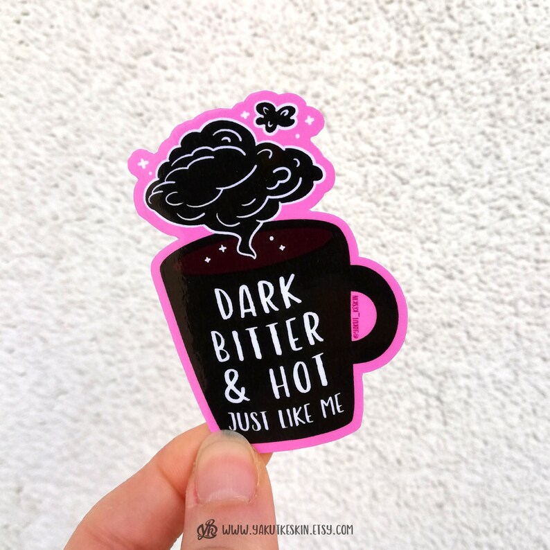 May include: Pink and black coffee mug sticker with a black cloud of steam and the text "DARK BITTER & HOT JUST LIKE ME".