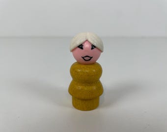 Vintage Fisher Price Farmer Mom med gul kropp, i gott skick