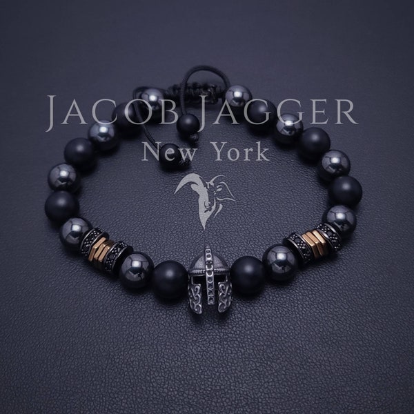 Bracelet casque guerrier spartiate pour homme. Bracelet homme en hématite et onyx, réglable avec pierres de 8 mm et breloques en acier inoxydable argenté.