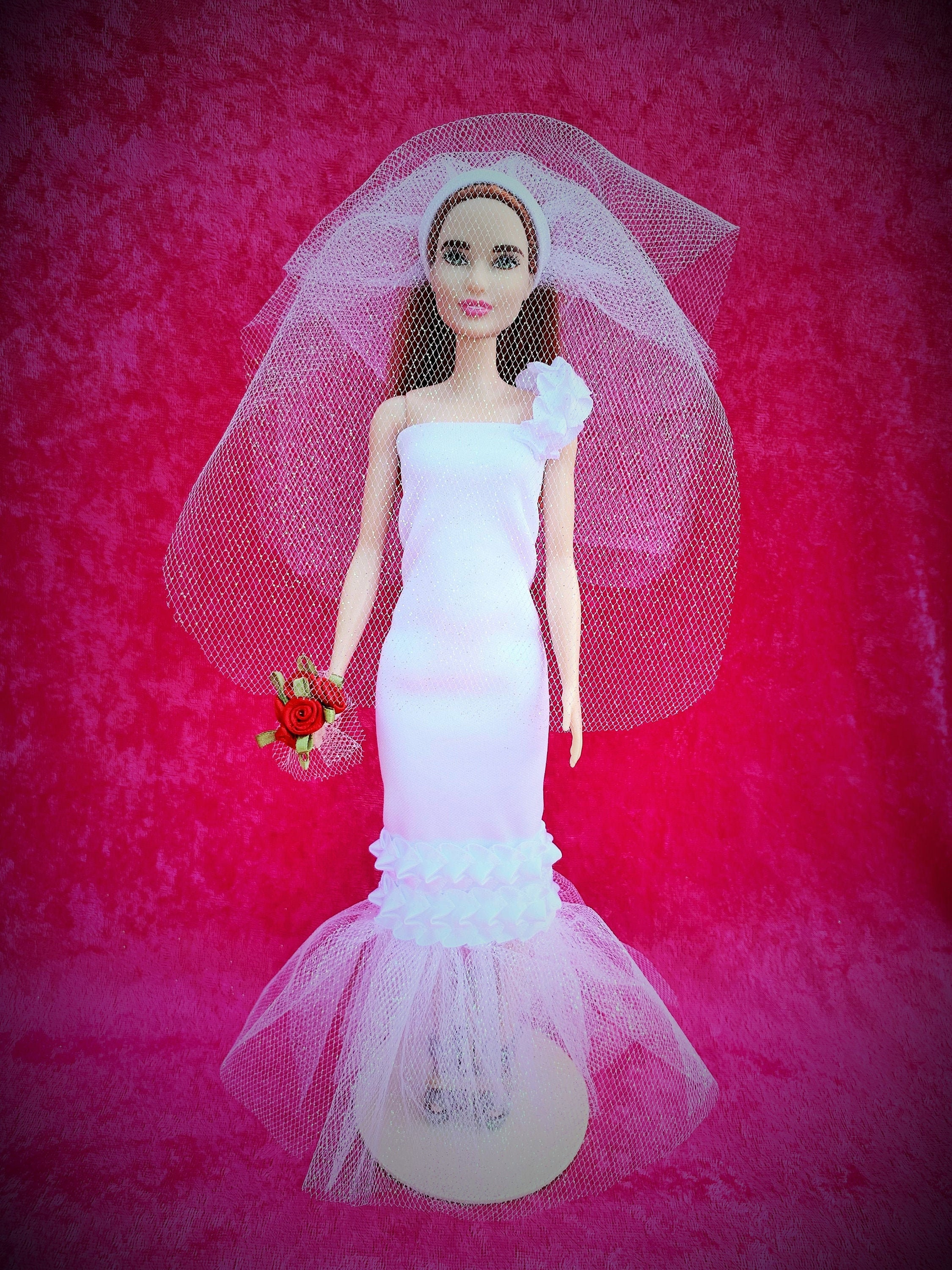 white wedding dress with red roses