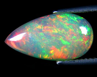 3.10 ct Eye-popping Pear Cabochon Cut (17 x 9 mm) Ethiopian Play of Colors Rainbow Opal Natural Loose Gemstone