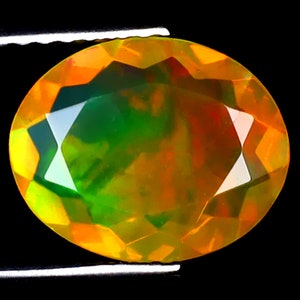 1.61 ct Extraordinary Oval (11 x 9 mm) Ethiopian 360 Degree Flashing Rainbow Opal Genuine Loose Gemstone