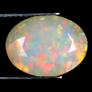 3.90 ct Superb Oval Cut (13 x 10 mm) Untreated and Unheated Transparent Quality Ethiopian Rainbow Opal Natural and Genuine Loose Gemstone