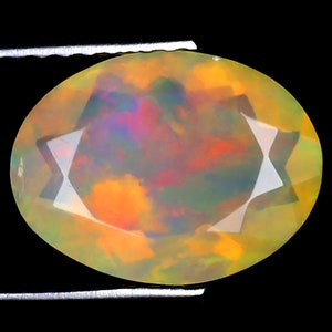 1.75 ct Premium Oval (11 x 9 mm) Ethiopian 360 Degree Flashing Rainbow Opal Genuine Loose Gemstone