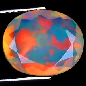 1.80 ct Outstanding Oval (11 x 9 mm) Ethiopian 360 Degree Flashing Rainbow Opal Genuine Loose Gemstone