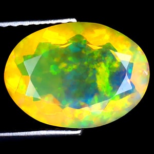 2.22 ct Magnificent fire Oval (11 x 8 mm) Ethiopian 360 Degree Flashing Rainbow Opal Genuine Loose Gemstone
