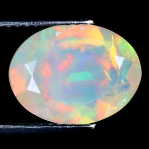 2.89 ct Unbelievable Oval (13 x 10 mm) Untreated and Unheated Transparent Quality Ethiopian Rainbow Opal Natural and Genuine Loose Gemstone