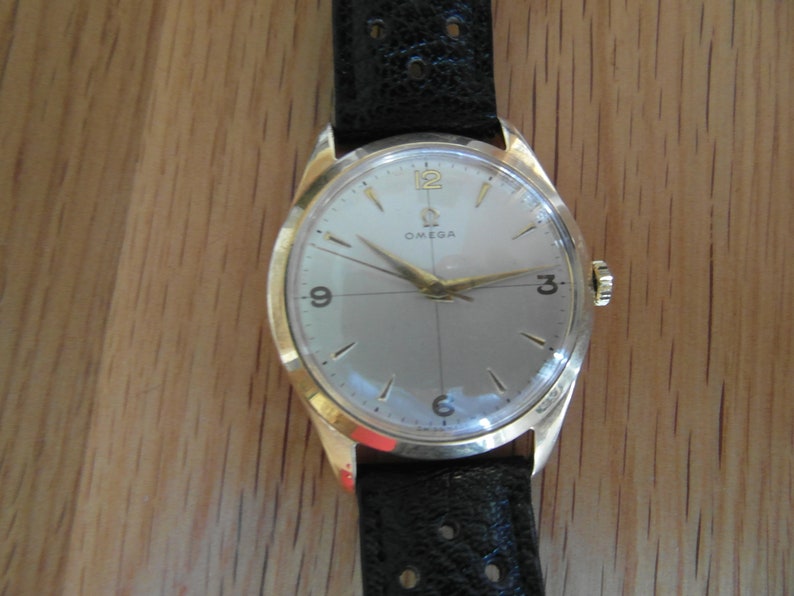 omega 18ct gold watch