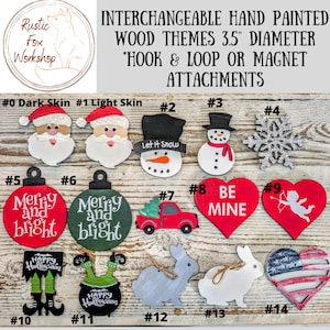 May include: Hand-painted wooden interchangeable themes, 3.5" diameter, with hook & loop or magnet attachments. Includes Santa, snowman, snowflake, ornaments, hearts, truck, rabbits, and Halloween designs.