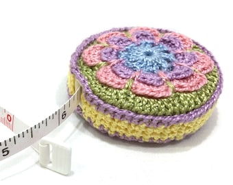 Retractable tape measure in handmade crochet cover is perfect gift for sewers, quilters, knitters, embroiderers. Has 60" measuring tape. #4