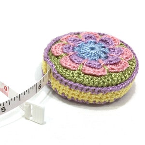 Retractable tape measure in handmade crochet cover is perfect gift for sewers, quilters, knitters, embroiderers. Has 60" measuring tape. #4