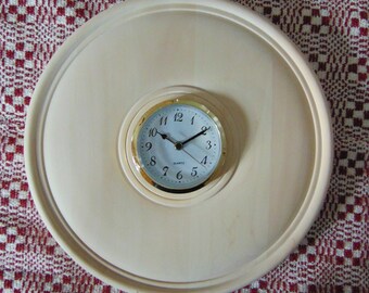 12-inch basswood, hand turned clock with insert.